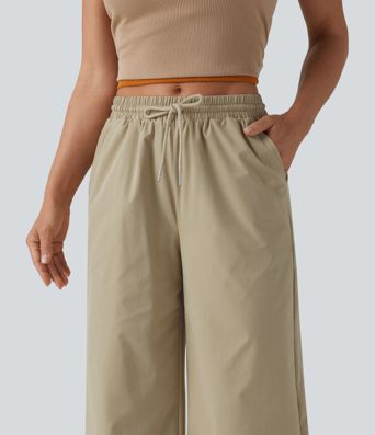 Lässige, weite Popeline-Hose mit mittlerer Bundhöhe, Kordelzug, kurz geschnitten, dehnbar und mit Taschen