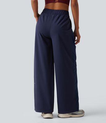 Pantalon droit d'entraînement taille mi-haute avec empiècements en mesh contrasté, séchage rapide et toucher frais, avec poches - UPF40+