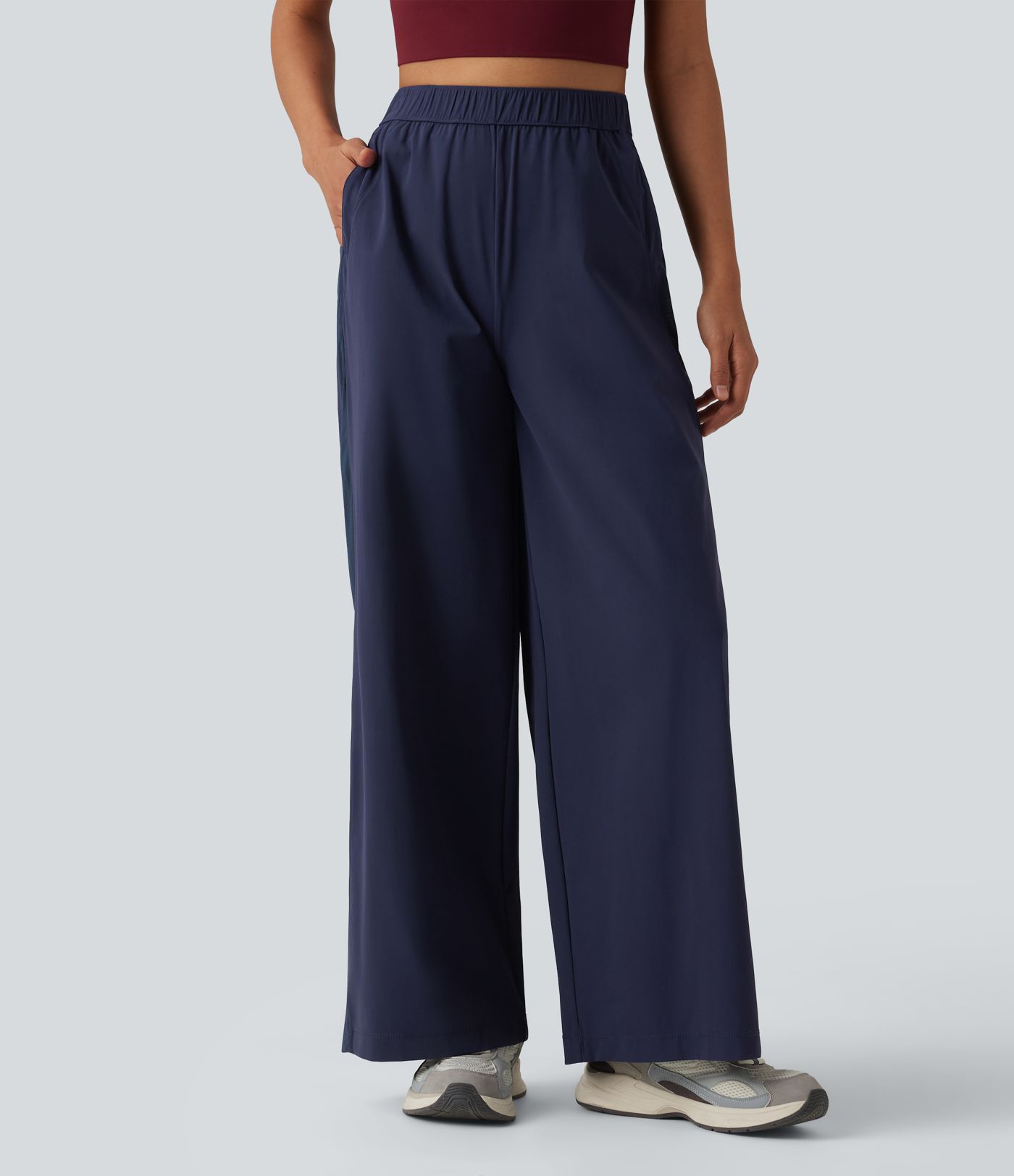 Pantalon droit d'entraînement taille mi-haute avec empiècements en mesh contrasté, séchage rapide et toucher frais, avec poches - UPF40+