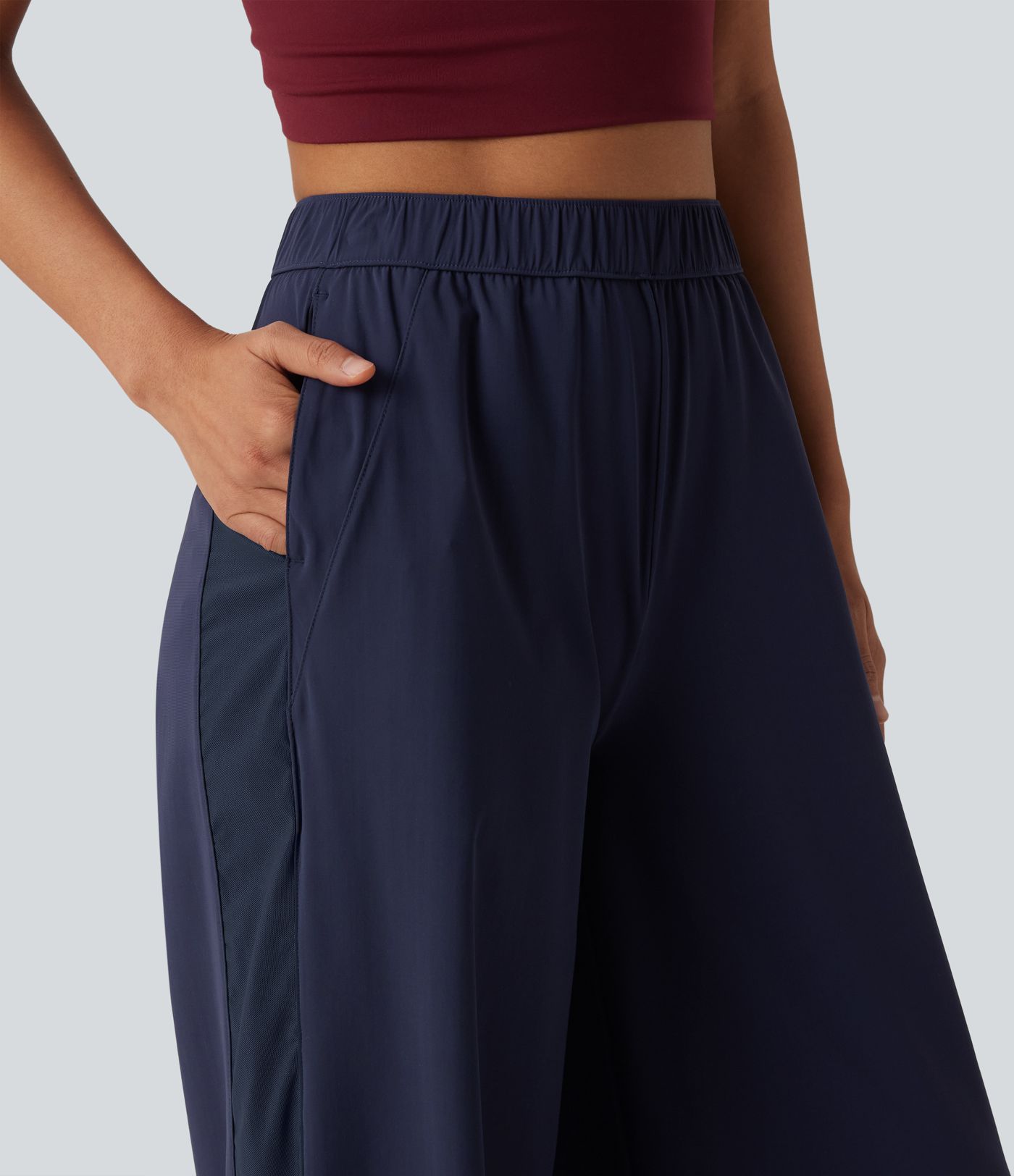 Pantalon droit d'entraînement taille mi-haute avec empiècements en mesh contrasté, séchage rapide et toucher frais, avec poches - UPF40+