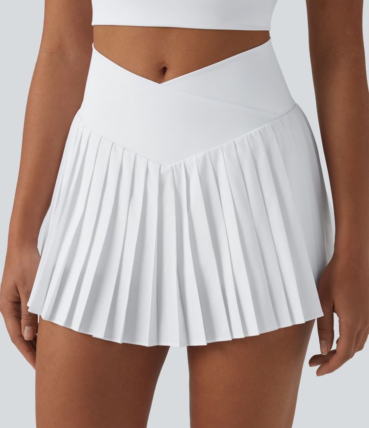 Breezeful™ Jupe-short tennis mini 2-en-1 plissée séchage rapide taille haute croisée avec poches