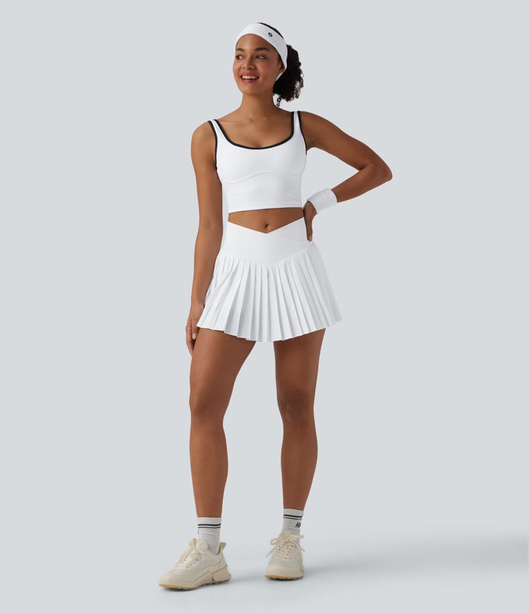 Breezeful™ Jupe-short tennis mini 2-en-1 plissée séchage rapide taille haute croisée avec poches