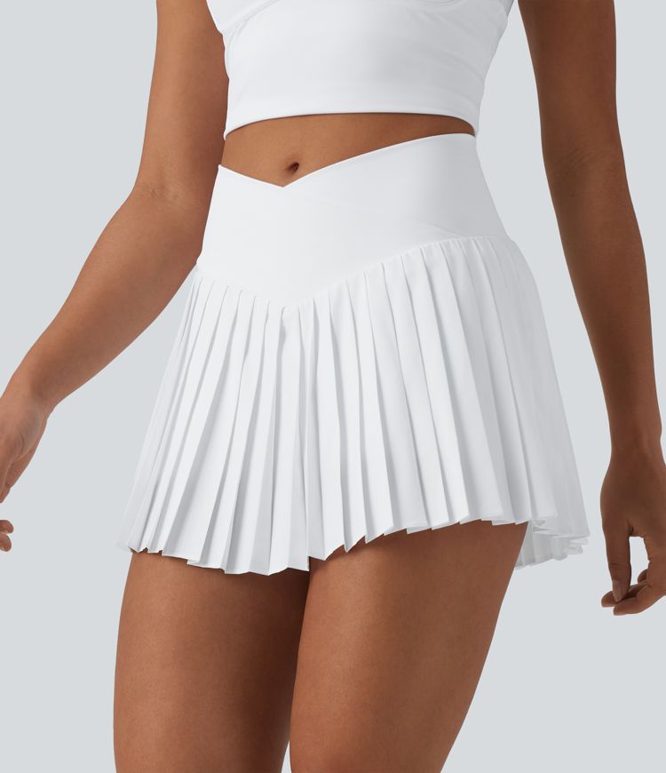 Breezeful™ Jupe-short tennis mini 2-en-1 plissée séchage rapide taille haute croisée avec poches