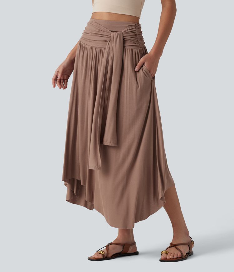 Jupe midi fluide casual gainante côtelée taille haute à nœuds latéraux et ourlet asymétrique avec poches