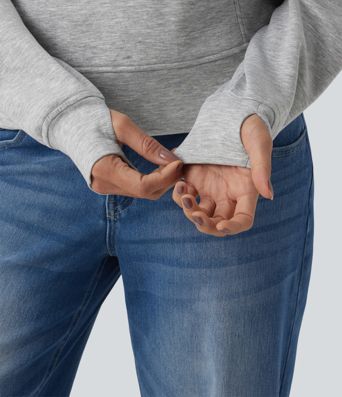 Felpa casual con collo a rever e mezza zip, maniche lunghe, apertura per i pollici e tasche