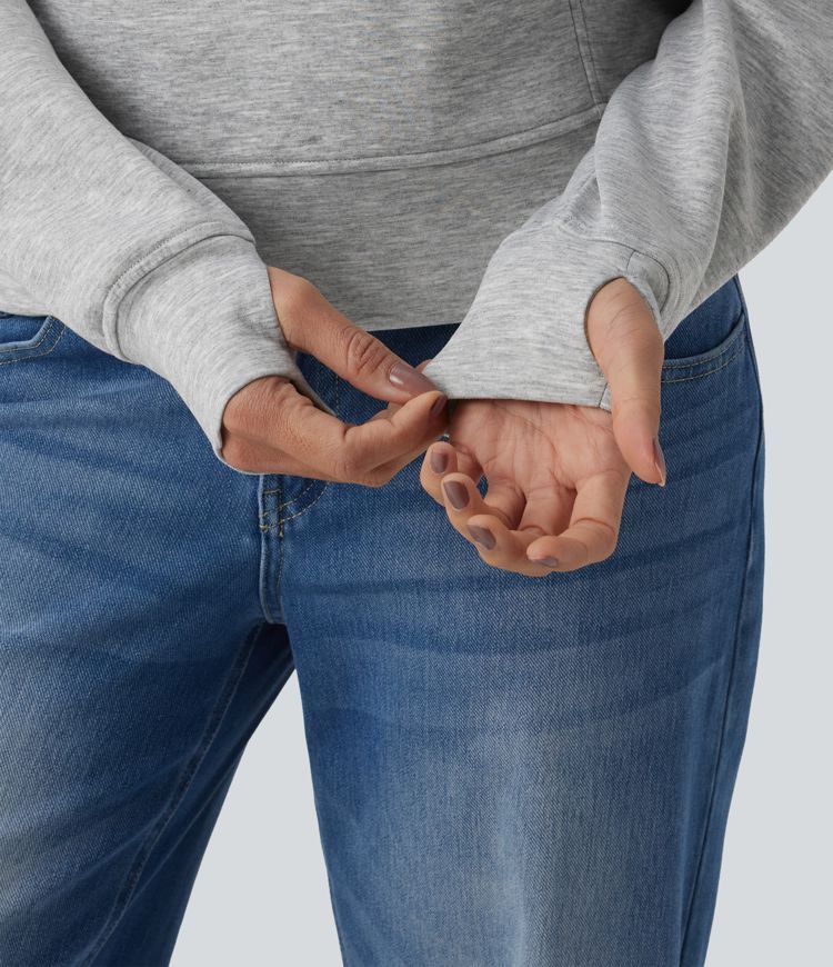 Felpa casual con collo a rever e mezza zip, maniche lunghe, apertura per i pollici e tasche