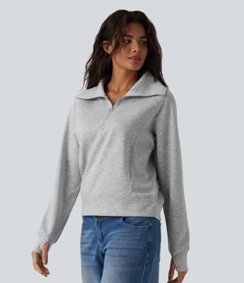 Felpa casual con collo a rever e mezza zip, maniche lunghe, apertura per i pollici e tasche