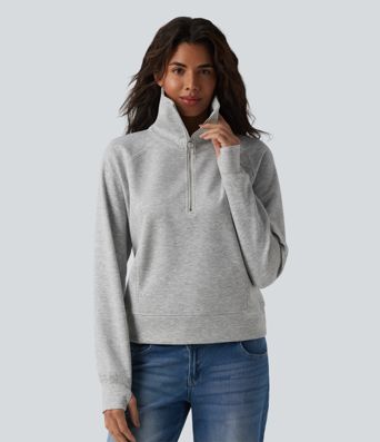 Felpa casual con collo a rever e mezza zip, maniche lunghe, apertura per i pollici e tasche