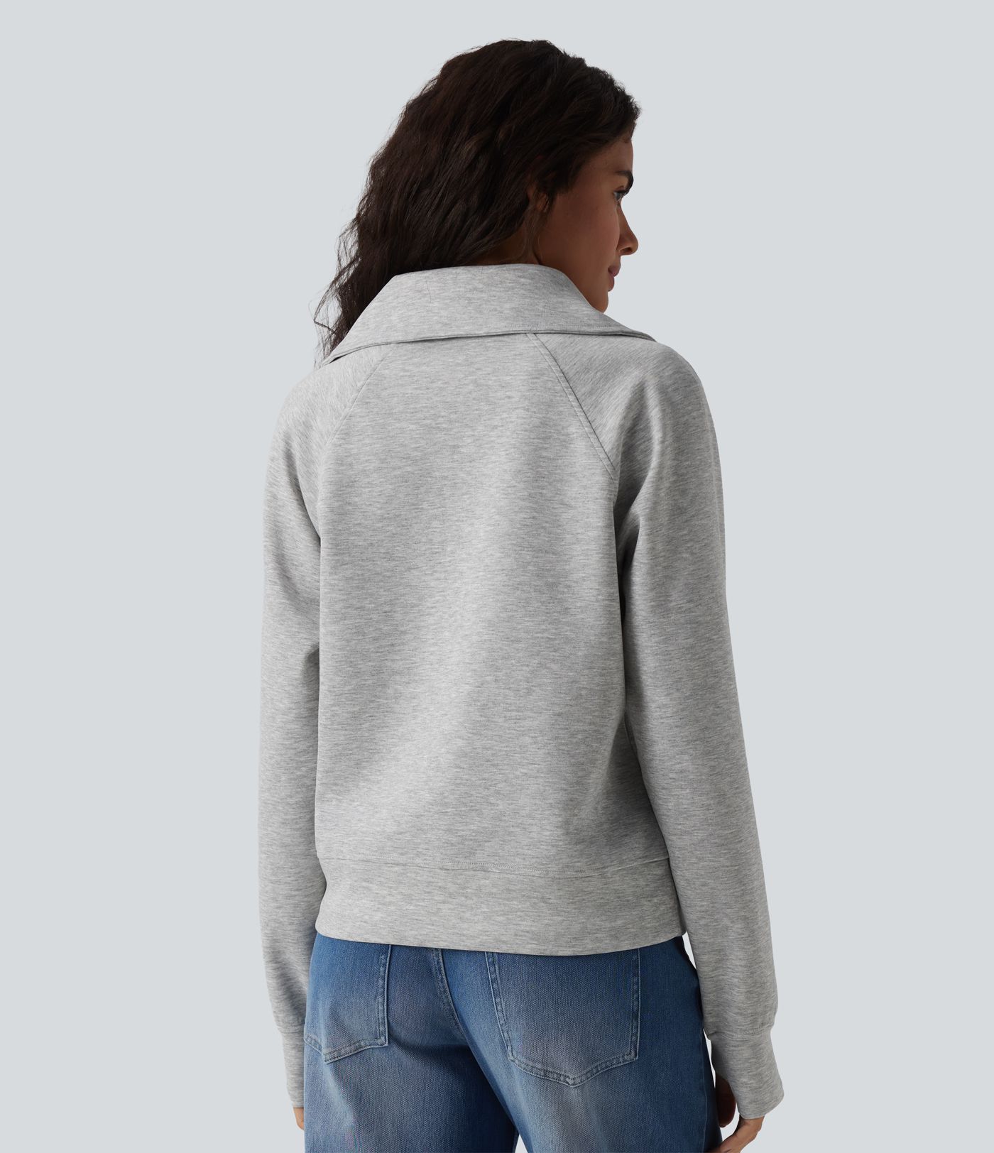 Felpa casual con collo a rever e mezza zip, maniche lunghe, apertura per i pollici e tasche