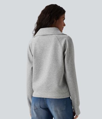 Felpa casual con collo a rever e mezza zip, maniche lunghe, apertura per i pollici e tasche