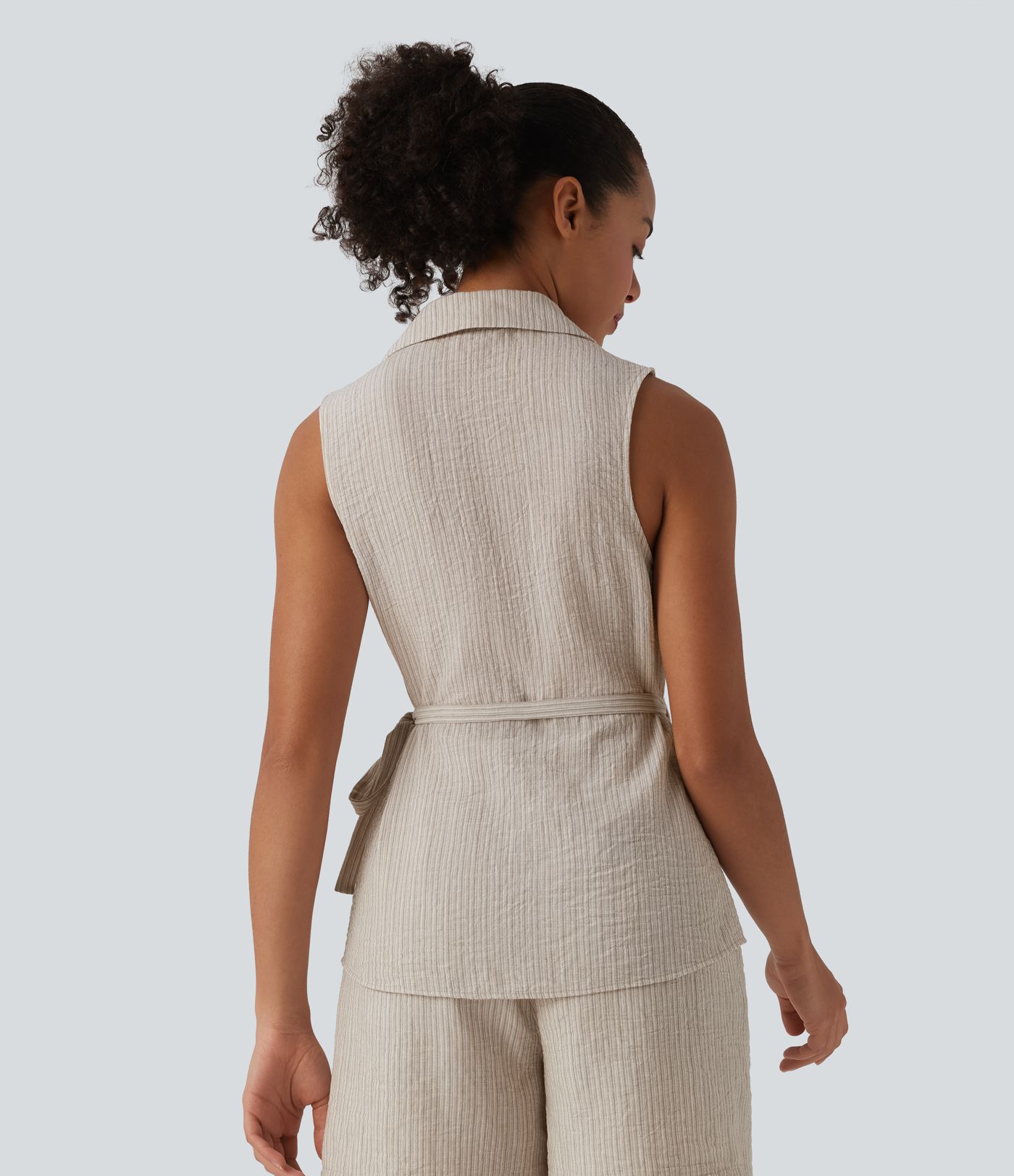 Camisa cruzada sin mangas con cuello y lazo lateral, estilo casual con tacto de lino