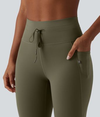 Gładkie legginsy do jogi 7/8 z wysokim stanem, sznurkiem w pasie i kieszeniami
