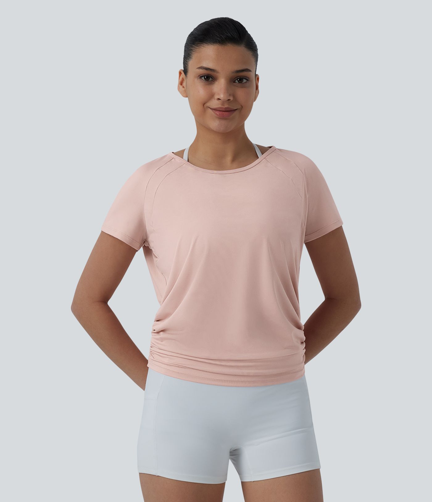 Top de sport pour le yoga à col rond, manches raglan courtes, dos découpé et froncé