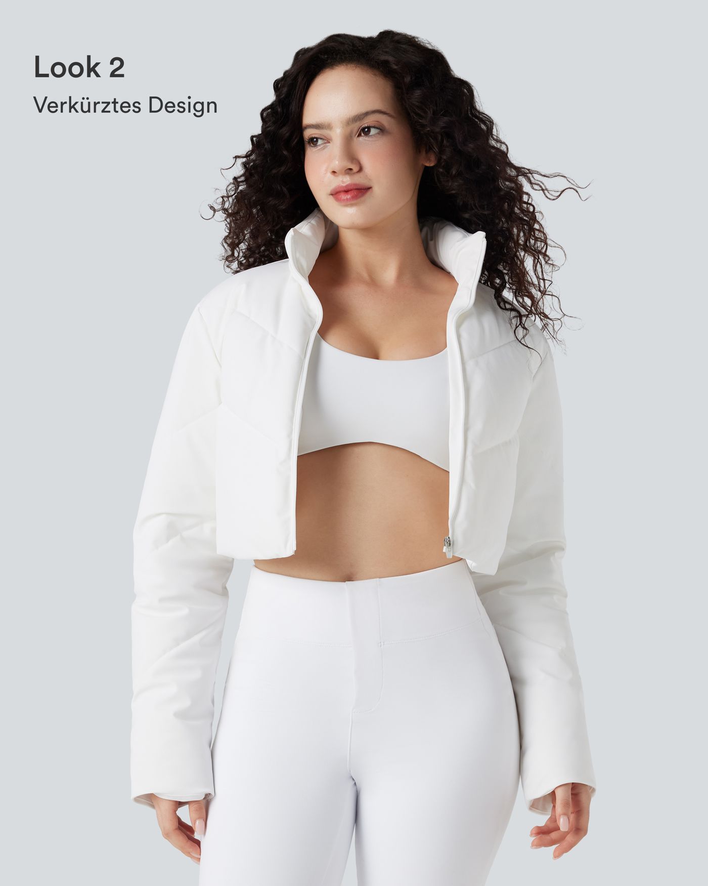 Lässige, kurze 3-in-1 Stretch-Pufferjacke mit Stehkragen, Seitentaschen, langen Ärmeln, Daumenlöchern und geschwungenem Saum