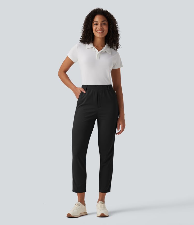 Schmal zulaufende Golfhose aus Krepp mit hohem Bund, Seitentaschen, reflektierenden Streifen und Golf-Tee-Taschen