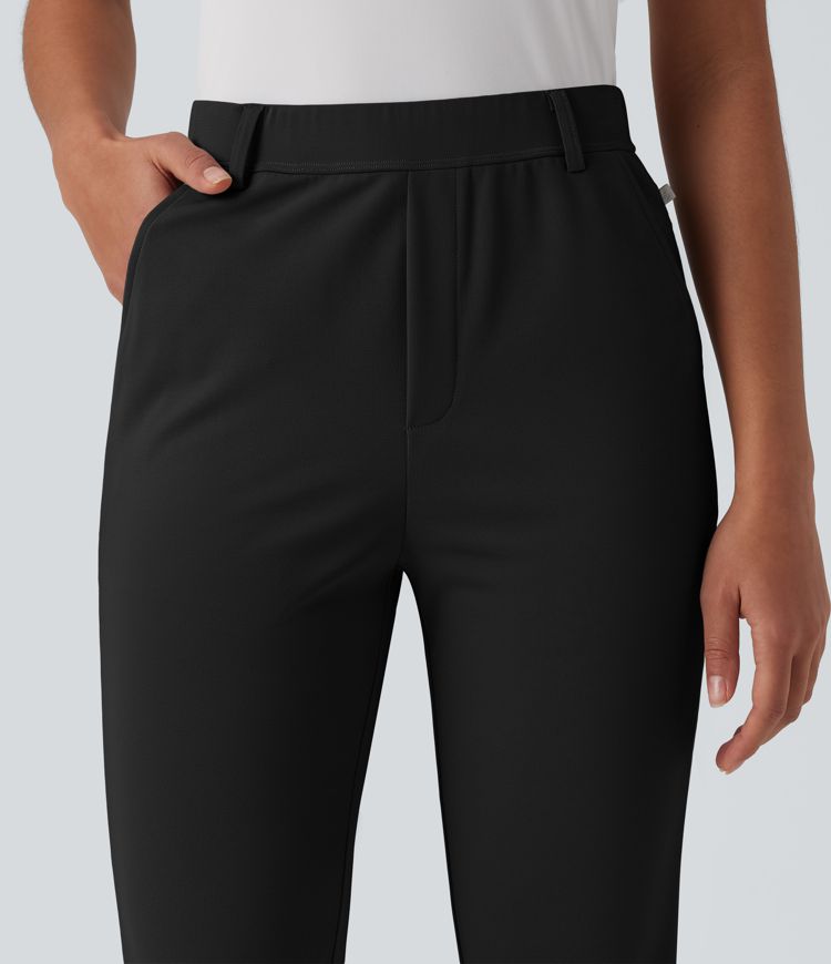 Schmal zulaufende Golfhose aus Krepp mit hohem Bund, Seitentaschen, reflektierenden Streifen und Golf-Tee-Taschen