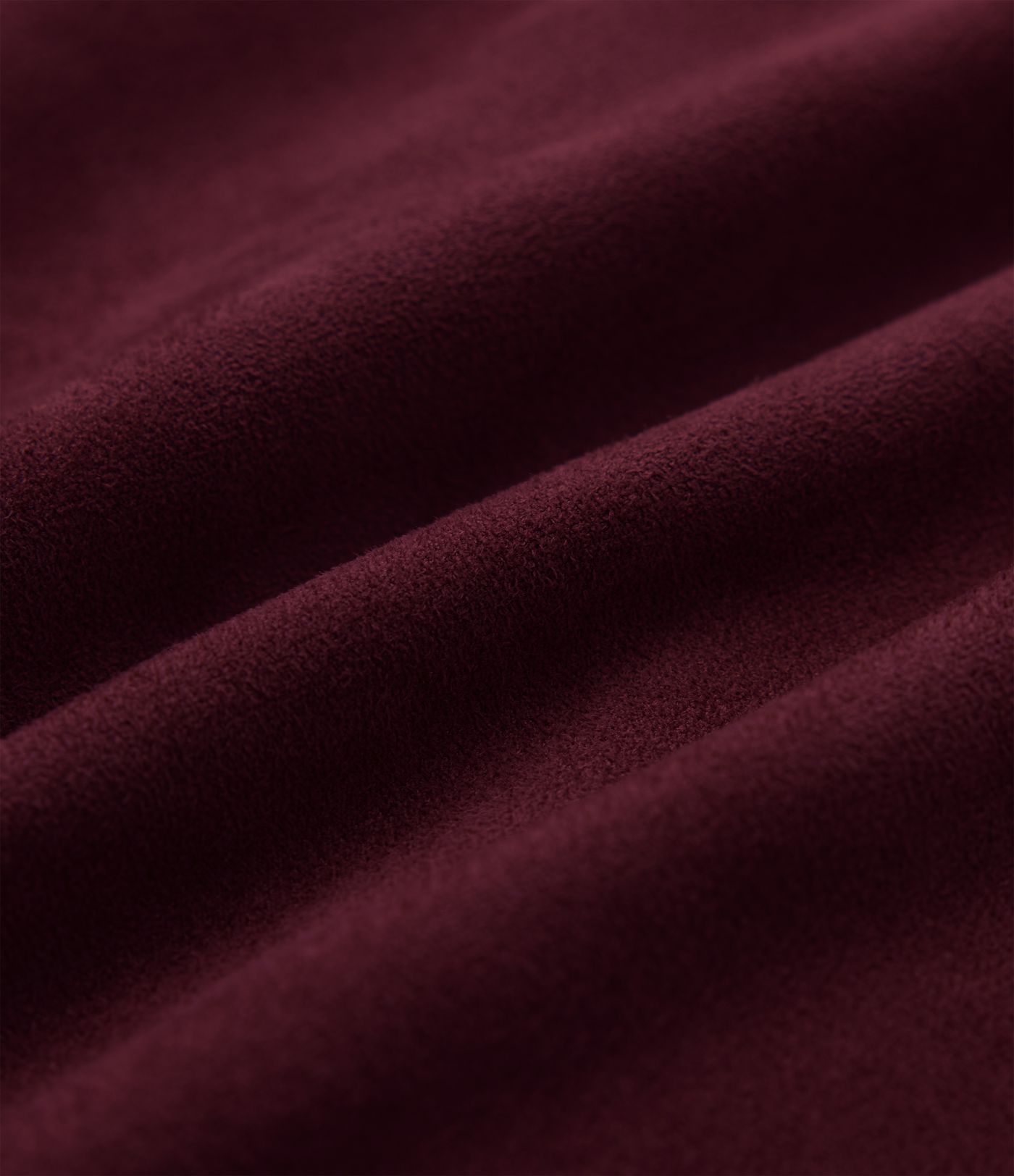 Jupe-short mini moulante taille haute gainante froncée en daim avec ourlet arrondi