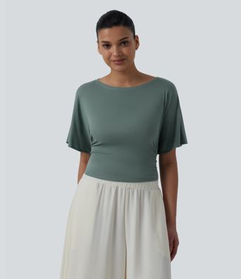 Haut décontracté à col bateau manches courtes à volants et dos noué