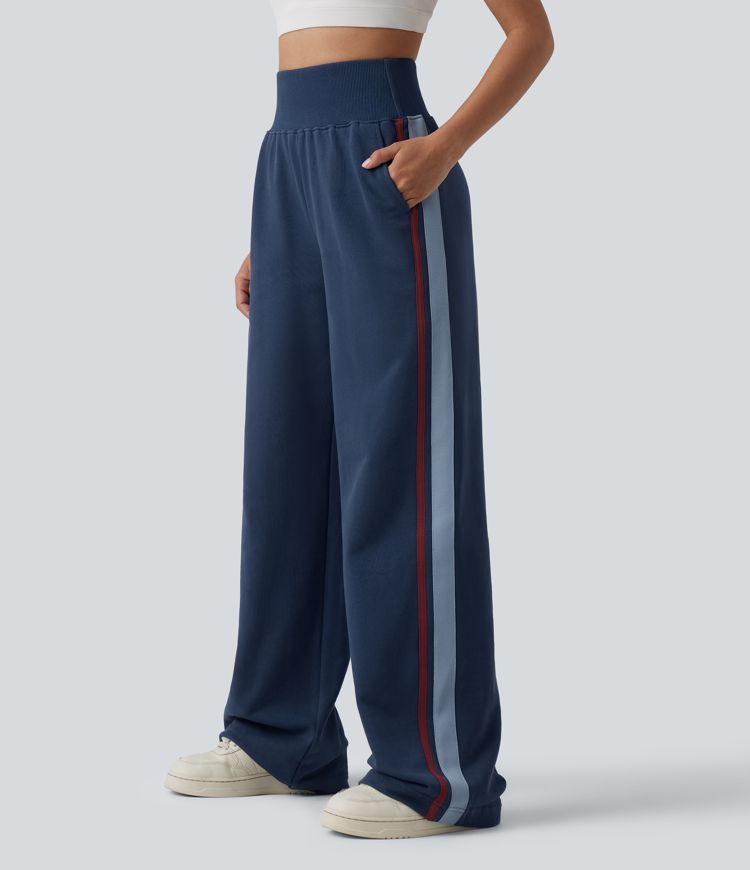 Baumwoll-Jogginghose mit hohem Bund, bauchgeformt, weitem Bein, gestreift und mit Taschen