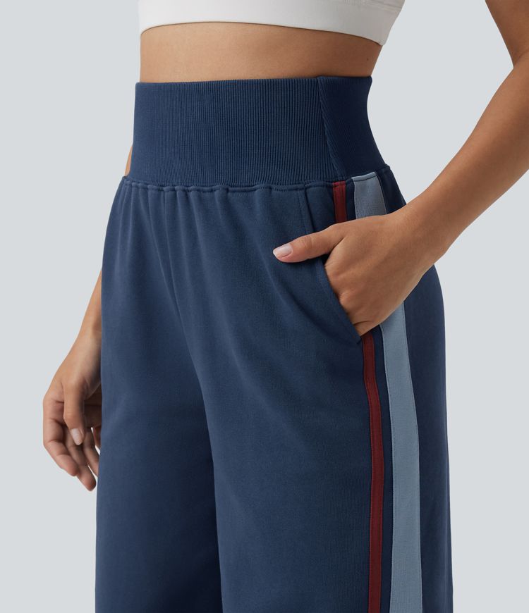 Baumwoll-Jogginghose mit hohem Bund, bauchgeformt, weitem Bein, gestreift und mit Taschen