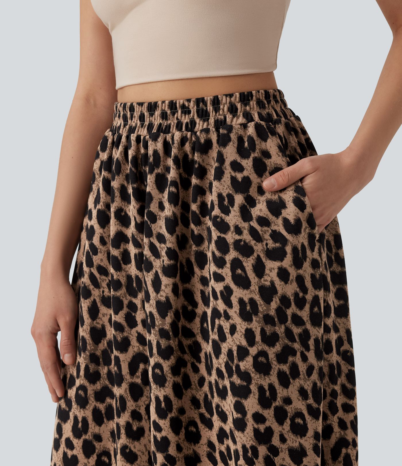 Lässige, hoch taillierte Jogginghose aus Waffelstoff mit fließendem Herbst, Leopardenmuster und Taschen.