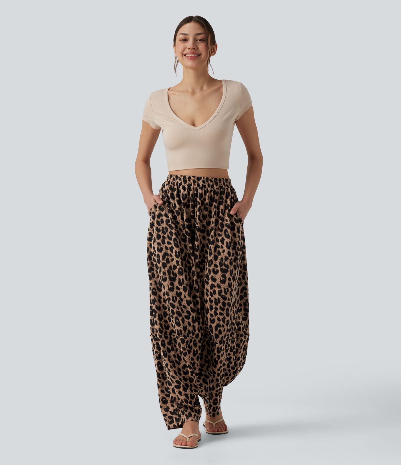 Lässige, hoch taillierte Jogginghose aus Waffelstoff mit fließendem Herbst, Leopardenmuster und Taschen.