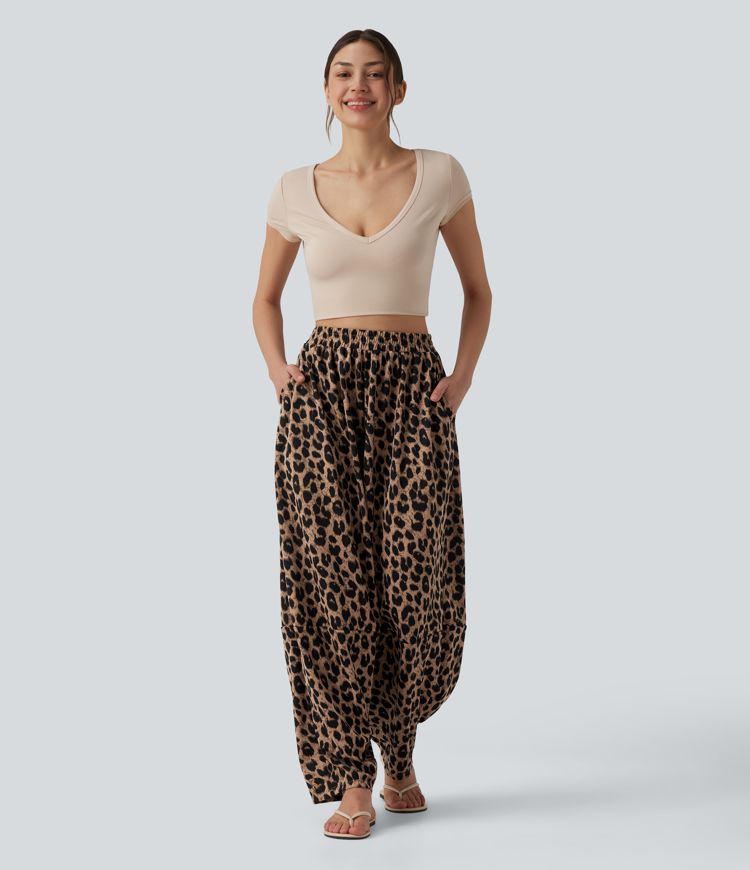 Lässige, hoch taillierte Jogginghose aus Waffelstoff mit fließendem Herbst, Leopardenmuster und Taschen.