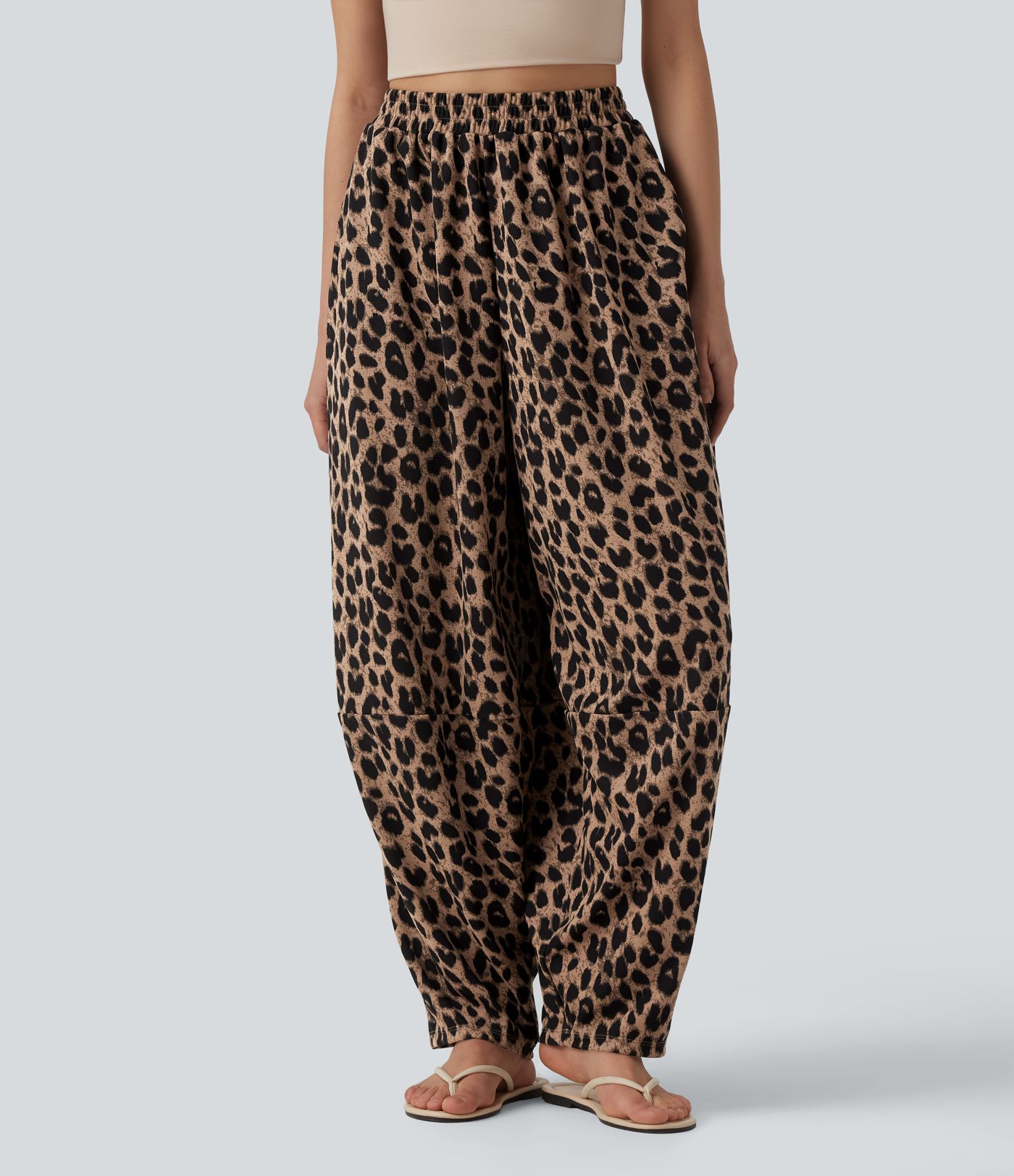 Lässige, hoch taillierte Jogginghose aus Waffelstoff mit fließendem Herbst, Leopardenmuster und Taschen.