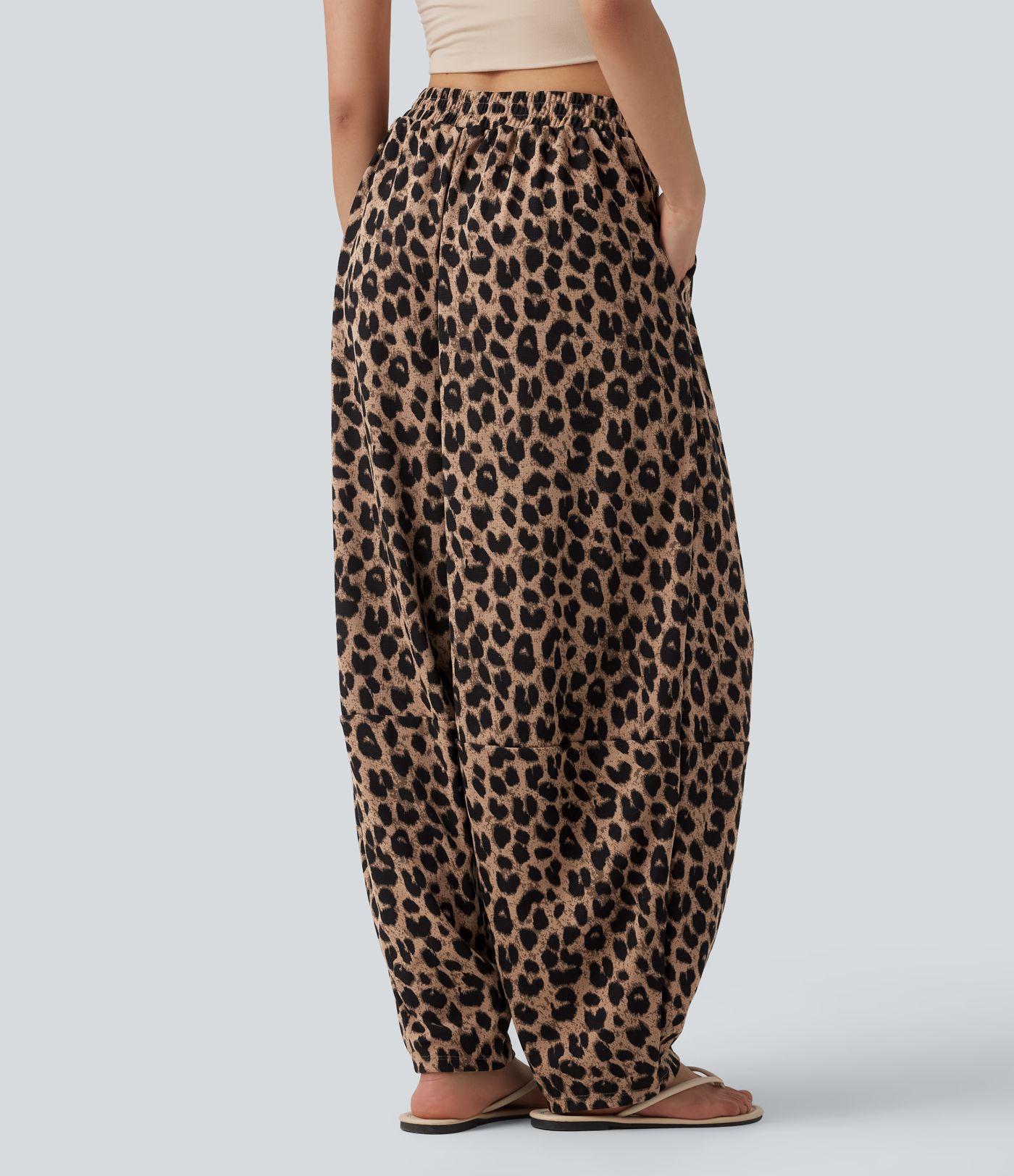 Lässige, hoch taillierte Jogginghose aus Waffelstoff mit fließendem Herbst, Leopardenmuster und Taschen.