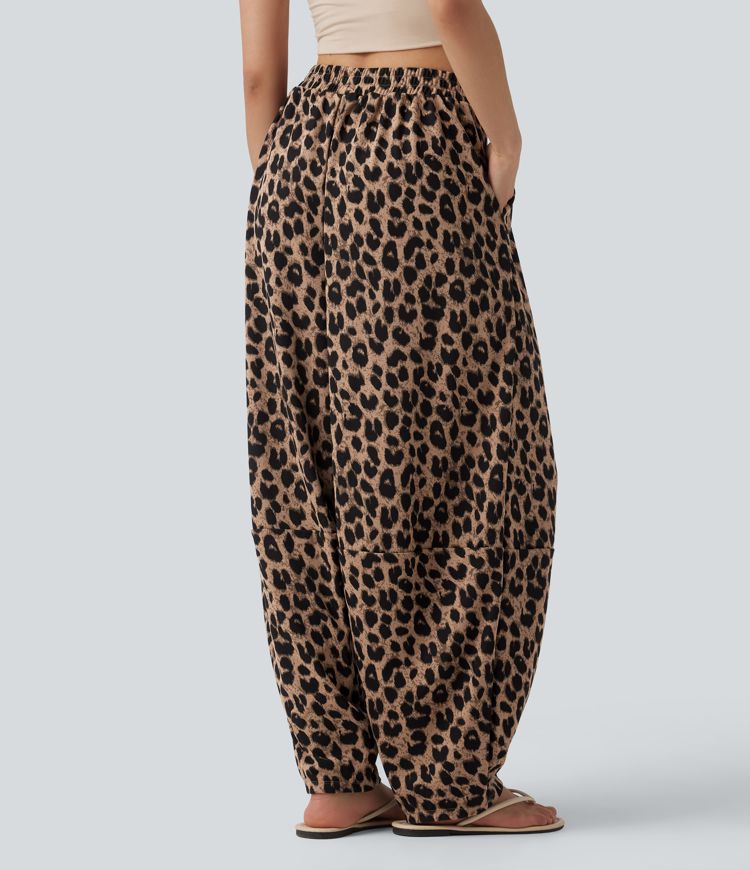 Lässige, hoch taillierte Jogginghose aus Waffelstoff mit fließendem Herbst, Leopardenmuster und Taschen.