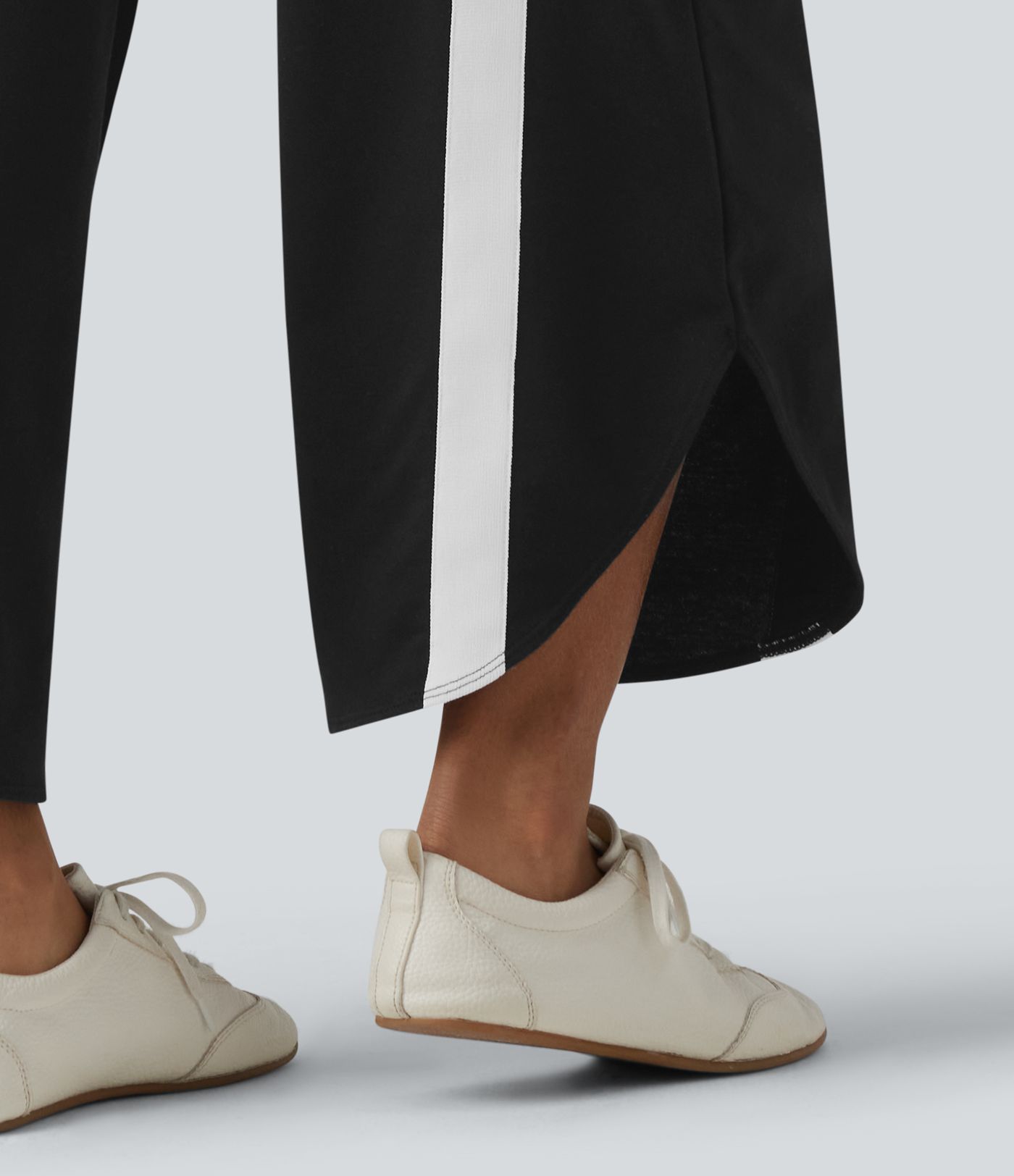 Lässige Jogginghose mit hohem Bund, mehreren Taschen, Kordelzug, Farbblock und abgerundetem Saum