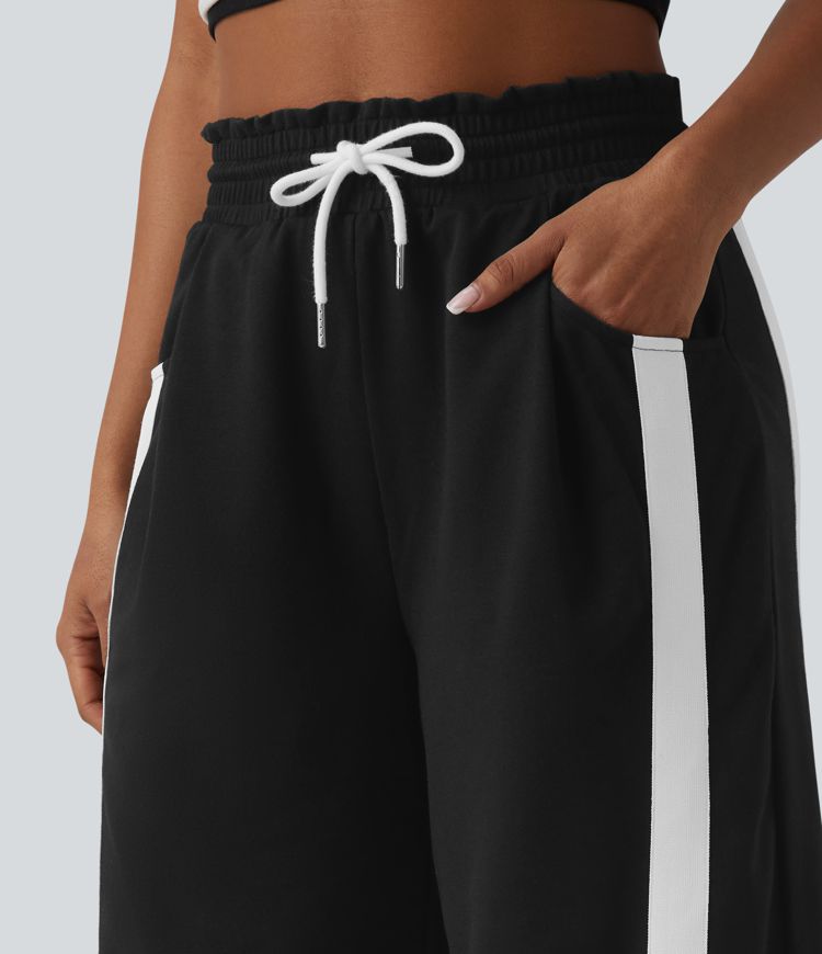 Lässige Jogginghose mit hohem Bund, mehreren Taschen, Kordelzug, Farbblock und abgerundetem Saum