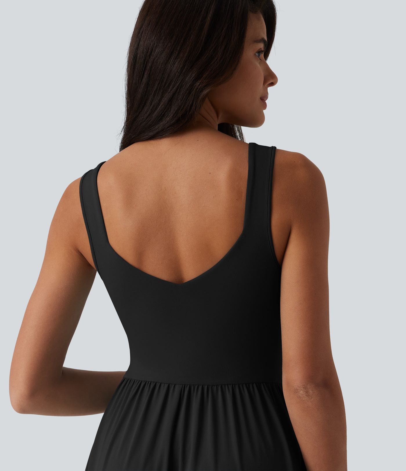 Robe décontractée midi fluide sans manches dos croisé avec poches D-F