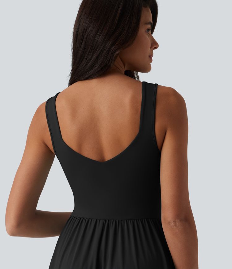 Robe décontractée midi fluide sans manches dos croisé avec poches D-F