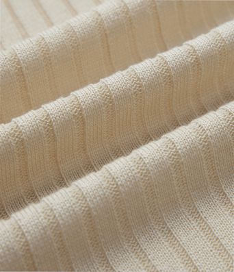 Ležérní svetr s kulatým výstřihem, netopýřími rukávy a překříženými, odhalenými zády