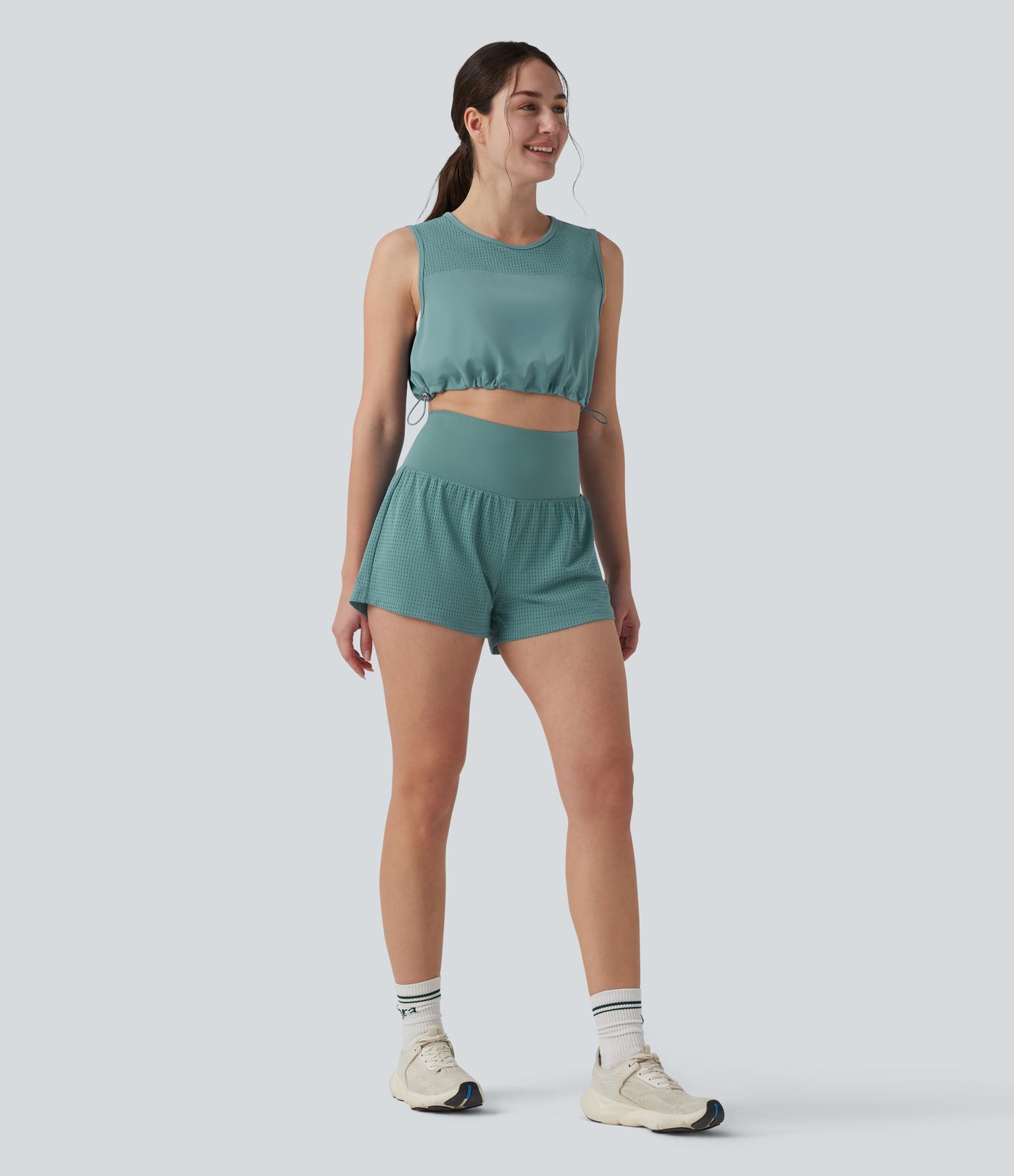 Kurzes Yoga-Tanktop mit Rundhalsausschnitt, Kordelzug und atmungsaktivem Netzgewebe