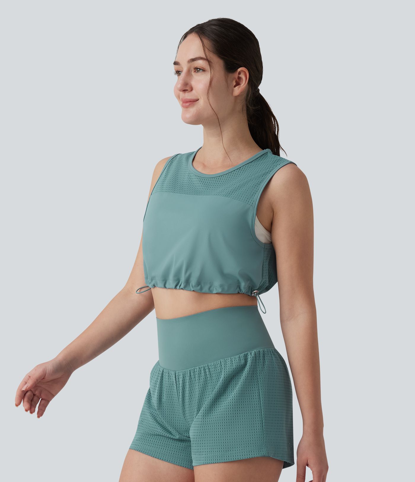 Kurzes Yoga-Tanktop mit Rundhalsausschnitt, Kordelzug und atmungsaktivem Netzgewebe