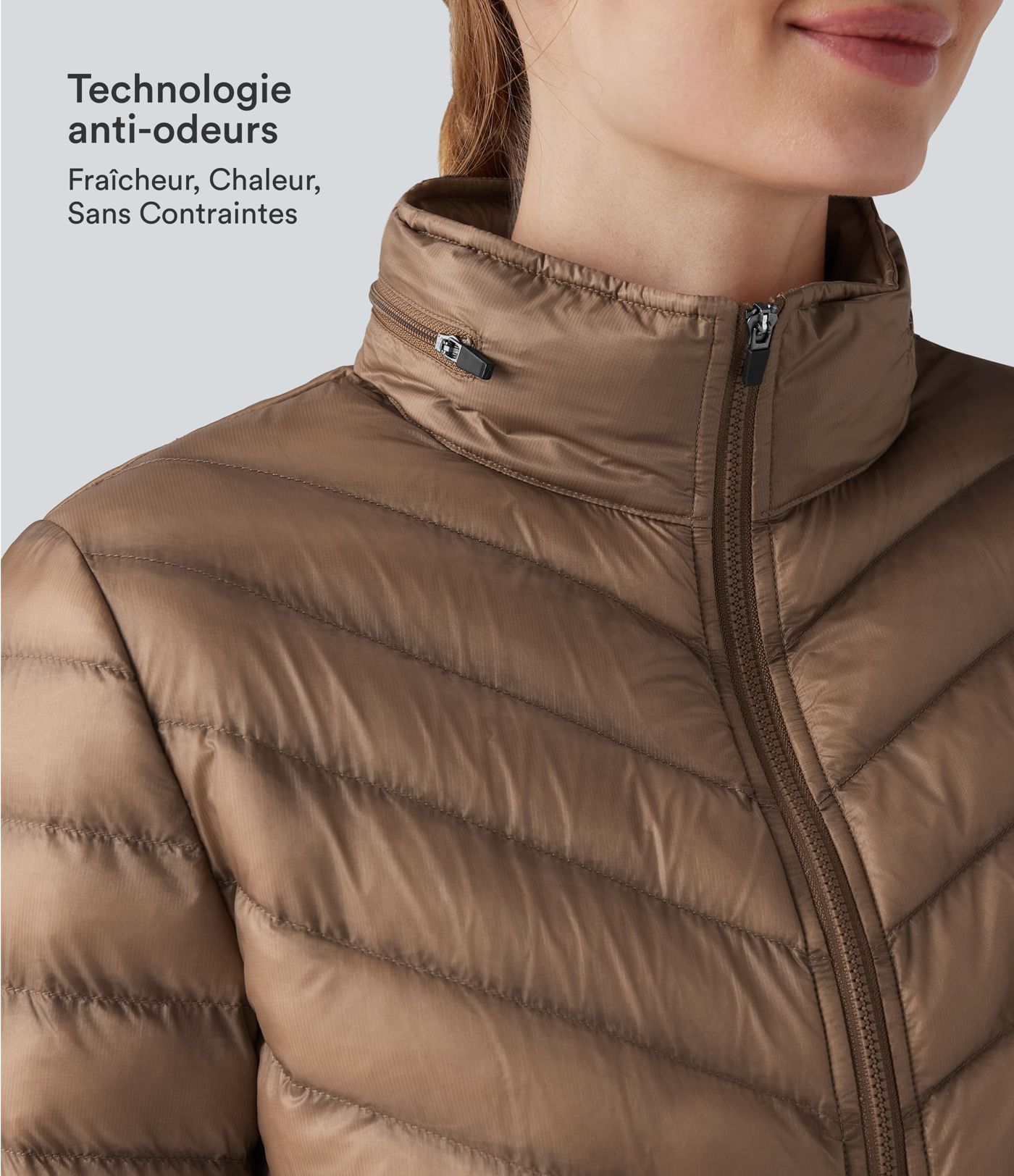 Packable casual zip-up jacket with synthetic down, stand-up collar, long sleeves, and pockets