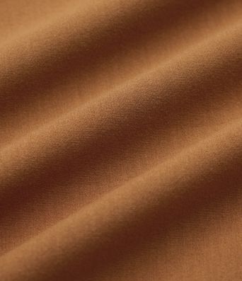 Top peplum de trabajo con escote redondo y manga corta