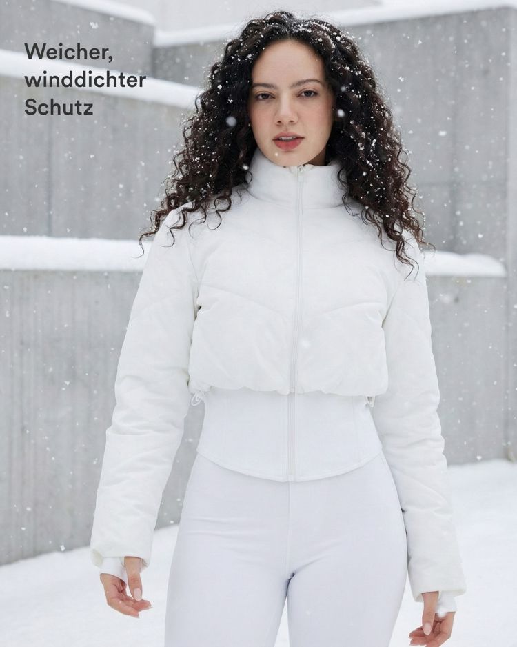 Lässige, kurze 3-in-1 Stretch-Pufferjacke mit Stehkragen, Seitentaschen, langen Ärmeln, Daumenlöchern und geschwungenem Saum