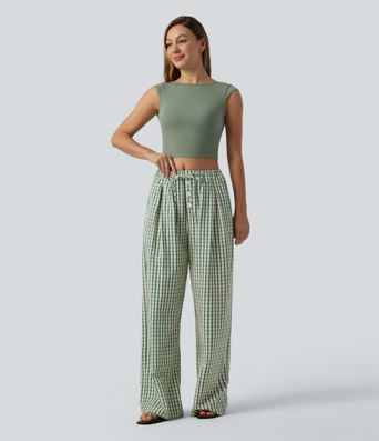 Lässige, karierte Hose mit mittlerer Bundhöhe, Kordelzug, weitem Bein und Taschen.