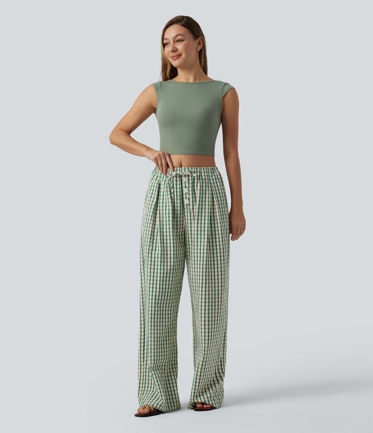 Lässige, karierte Hose mit mittlerer Bundhöhe, Kordelzug, weitem Bein und Taschen.