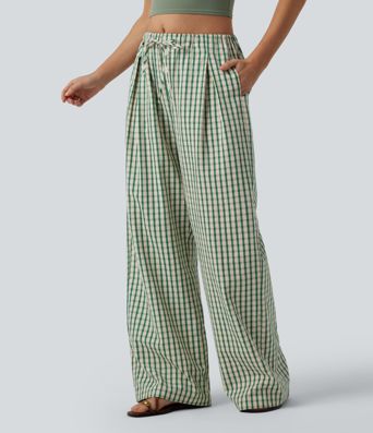 Lässige, karierte Hose mit mittlerer Bundhöhe, Kordelzug, weitem Bein und Taschen.