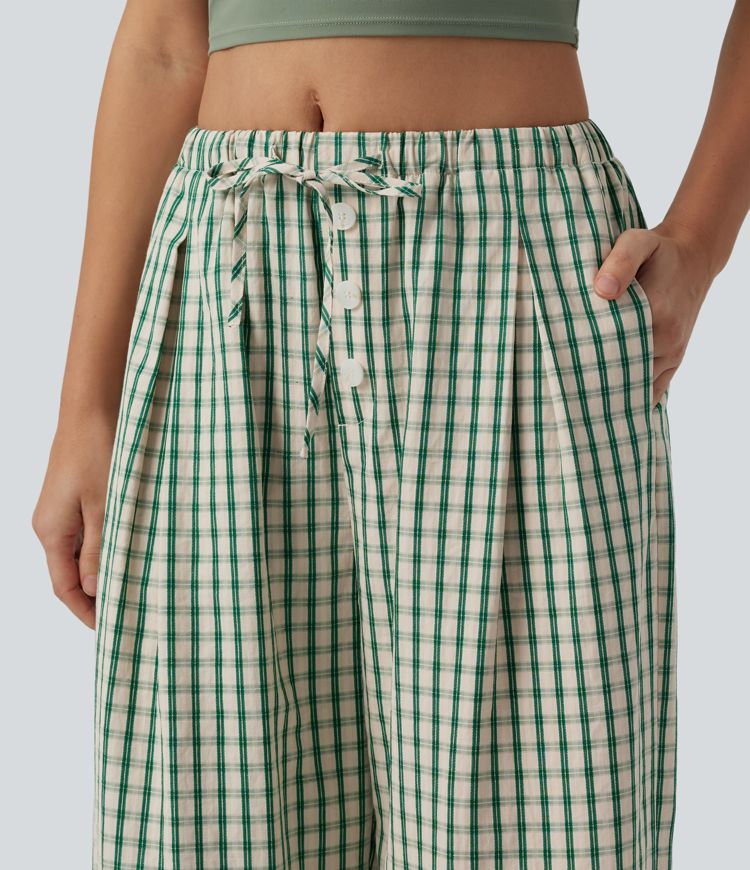 Lässige, karierte Hose mit mittlerer Bundhöhe, Kordelzug, weitem Bein und Taschen.