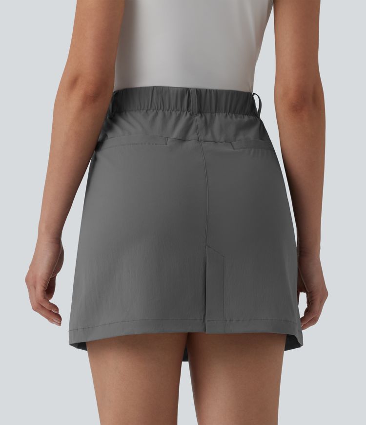Mini-jupe de golf taille haute, coupé trapèze, avec poches — longueur allongée