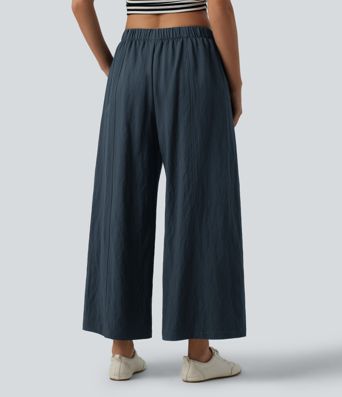 Pantalon décontracté taille mi-haute à coupe large avec poches