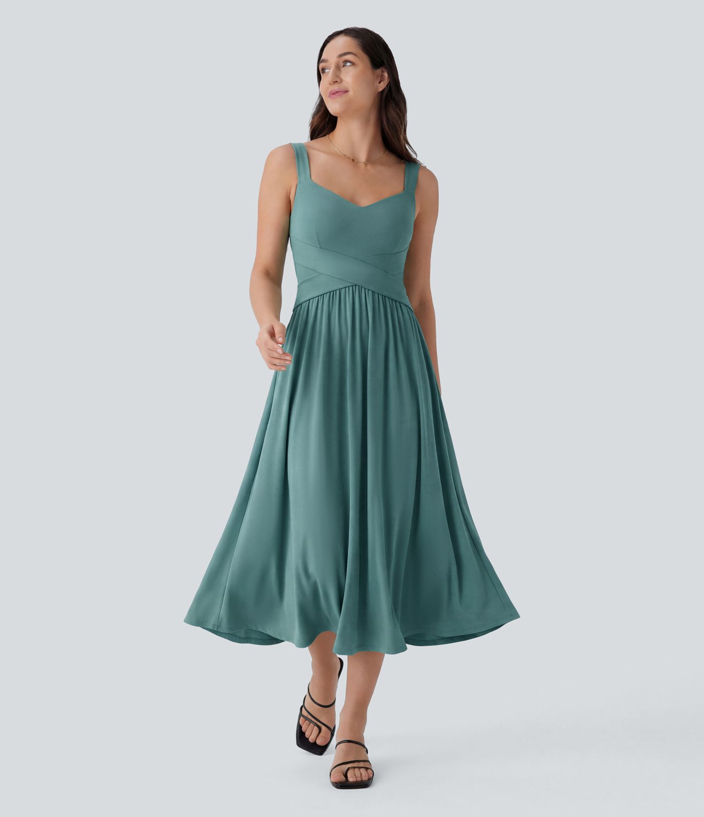 Robe décontractée midi fluide sans manches dos croisé ouvert avec poches