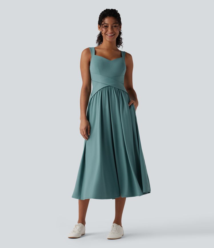 Robe décontractée midi fluide sans manches dos croisé ouvert avec poches