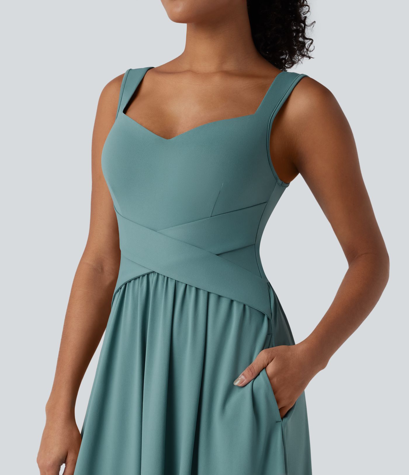 Robe décontractée midi fluide sans manches dos croisé ouvert avec poches