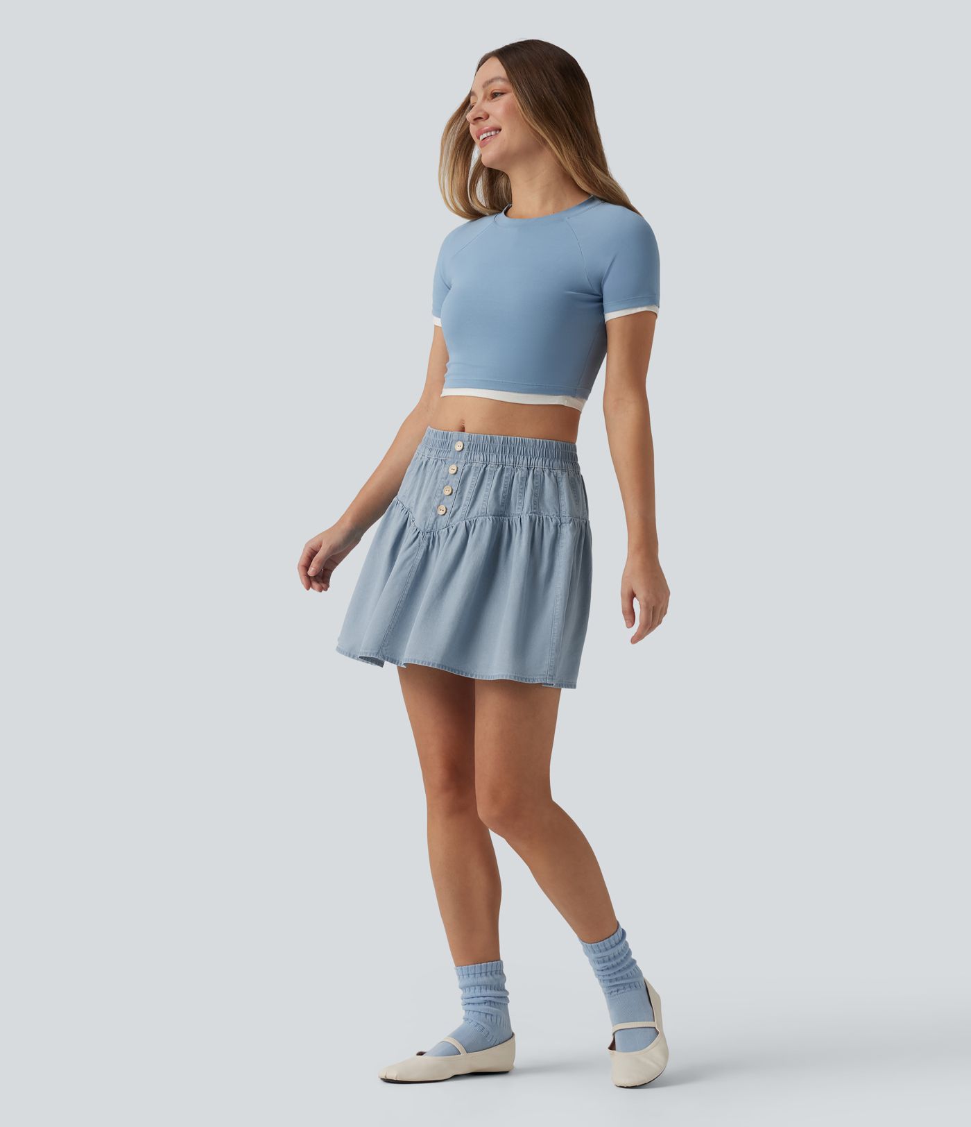 Drapierter Minirock aus Lyocell-Denim mit mittlerer Bundhöhe, lässiger A-Linien-Schnitt Drapierter Minirock aus Lyocell-Denim mit mittlerer Bundhöhe, lässiger A-Linien-Schnitt